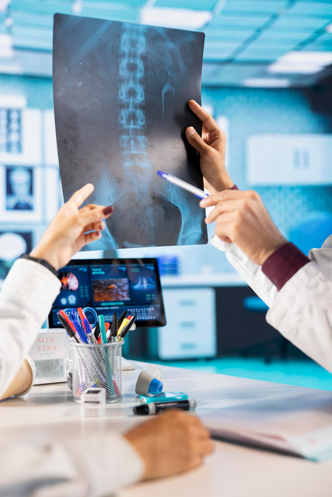 Doctor performing advanced diagnostics for back pain evaluation